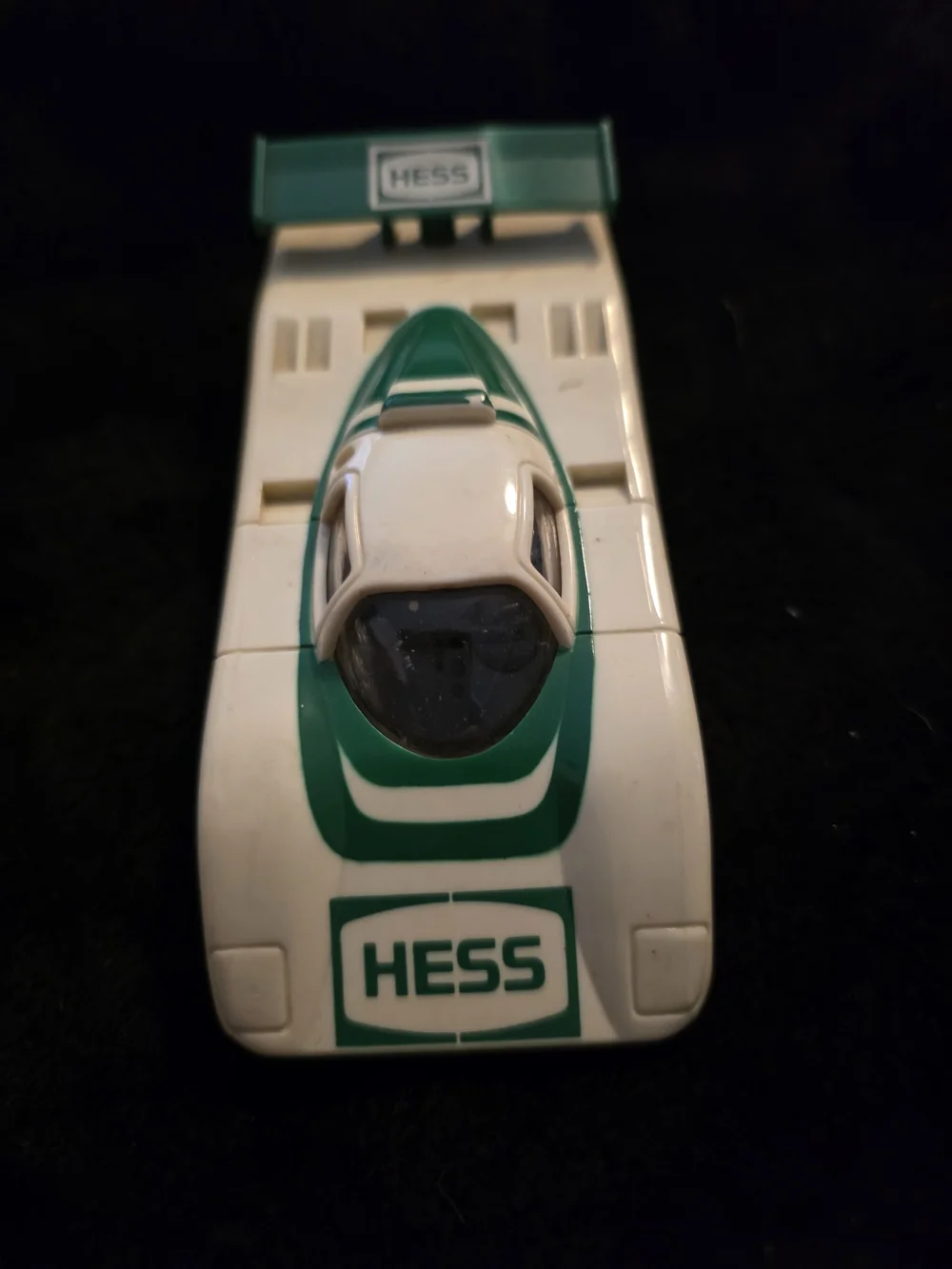 vintage 1988 Friction Activated Hess Race Car, a classic white and green plastic